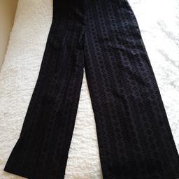 Brand new DKNY trousers with small holes so a little see through.  Never tried on.  They are a little too long for me and I am 5ft 4".  

Perfect for a summer's evening 

Any questions then please ask