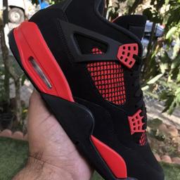 The Air Jordan 4 Retro ‘Red Thunder’ features familiar color blocking that recalls the coveted ‘Thunder’ colorway, originally released in 2006 and subsequently reissued in 2012. The mid-top sports a black nubuck upper with contrasting pops of crimson in lieu of the older shoe’s Tour Yellow accents. They appear on the sneaker’s molded eyelets, interior tongue, quarter panel, throat and midsole, which packs visible Air-sole cushioning under the heel. Jumpman branding decorates the tongue tag and heel.