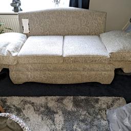 2 seater drop arm sofa.  Converts to single sofa bed. Still selling at HSL furniture for £1295. No marks or fading. Hardly sat on and never used as a sofa bed. Pick up only