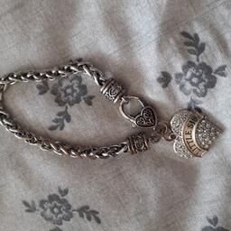 Little Sis charm bracelet. silver plated. slight discolouration, can be cleaned.

COLLECTION ONLY from WV14 8BX unless local.
