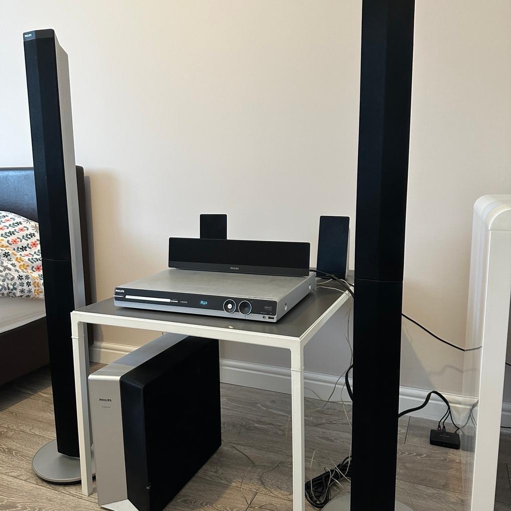 Philips DVD home theatre system HTS3357, all working fine, with remote control, also included Bluetooth receiver with cable so it is allowing to connect your phone, collection only £60