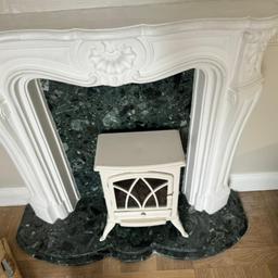ornate plaster fireplace surround with marble backing and hearth size in photos .pick up basildon possible local delivery for small fee .electric fire not included.size on photos