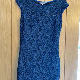 Lovely like new body con fitted dress 

Blue stretchy material. Slightly glittery. Really nice. 

Small size 12

Check out my other items.