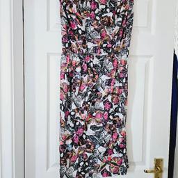 Butterfly design dress, strapless, strong elasticated top and elasticated waist, size 12.

cash and collection only, thanks.
possible delivery to Conisbrough on Saturday mornings only around 11 am.