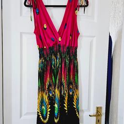 Lovely, brightly patterned, easy wear dress. elasticated waist and pull tie fastening shoulders. would be great as a holiday dress or over beachwear, size 16.

cash and collection only, thanks.
possible delivery to Conisbrough on Saturday mornings only around 11 am.
