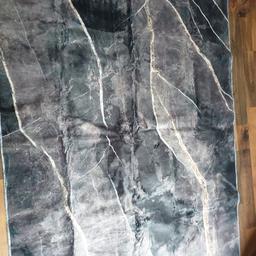 beautiful grey velvet marble effect rug
non slip 
170cmx120cm 
brand new