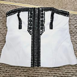 White coloured top, lined and has a black bead and sequin design front, side zip fastening, size 16.

cash and collection only, thanks.
possible delivery to Conisbrough on Saturday mornings only around 11 am.