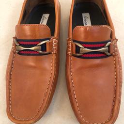 This is a lovely pair of mans tan leather moccasins size 8 and worn only once for one occasion. Collection only
