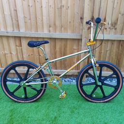 2019 Monza Bicycle Club 24 inch BMX cruiser, caliper brakes front and rear, not the later bikes with v brakes.
In exceptional condition not a mark on it only ridden a few times.
Tange Cro-mo frame and forks.
3 piece crank Cro-mo chrome with 44T gold chainring
Monza gold Bear trap pedals.
Dia- Compe old school calipers front and rear
Tange Grips

24 inch black Skyways.

Upgrade parts
SE gold alloy A head set and adapter
SE Cruiser seat
Billy Bonkers gravel bronze wall foldable tyres.
