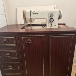 Sewing machine table for sale. Excellent condition. No damage. Vintage look extremely strong and robust. 

Length 33inches
Width 24 inches

Opens up and panel for sewing machine allows for it rise. 

Everything including area for sewing pedal tidies away.

Sewing machine not included.