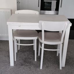 Extendable Ikea dining table and two chairs. 
90L-50W-74H Extended 90L-89W-74H 
Few scratches , set can be painted ower.