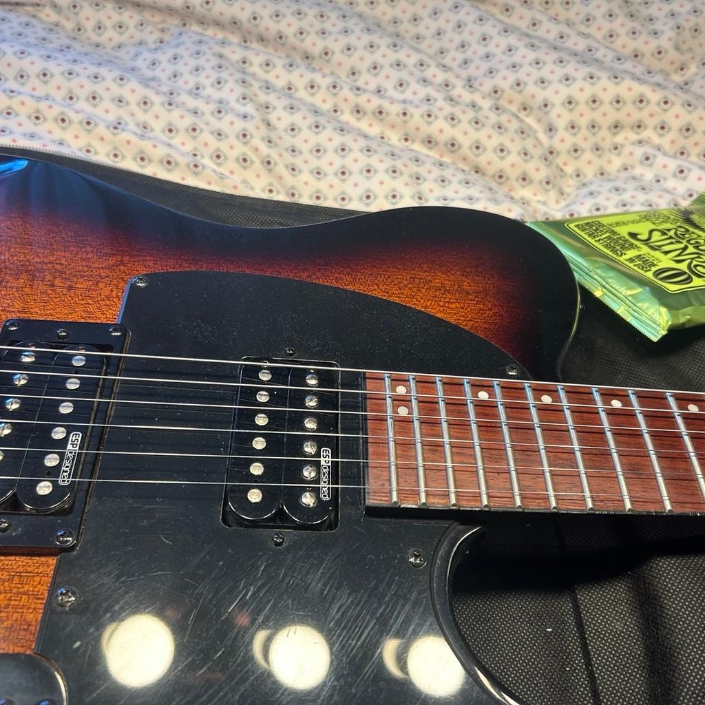 LTD TE-200 , twin humbucker tele style electric guitar with ESP designed pickups, Rosewood - Tabacco Sunburst. Bought and only been used a couple of times , newly re-strung .