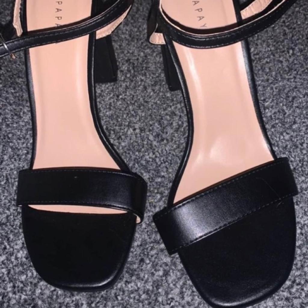Black heels size 5 never worn only tired on sorry don’t have box they came in but are new
