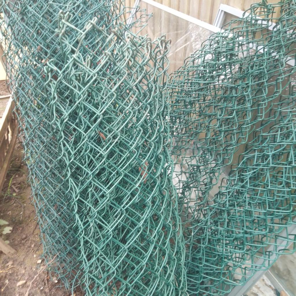 a selection of green wire garden fencing