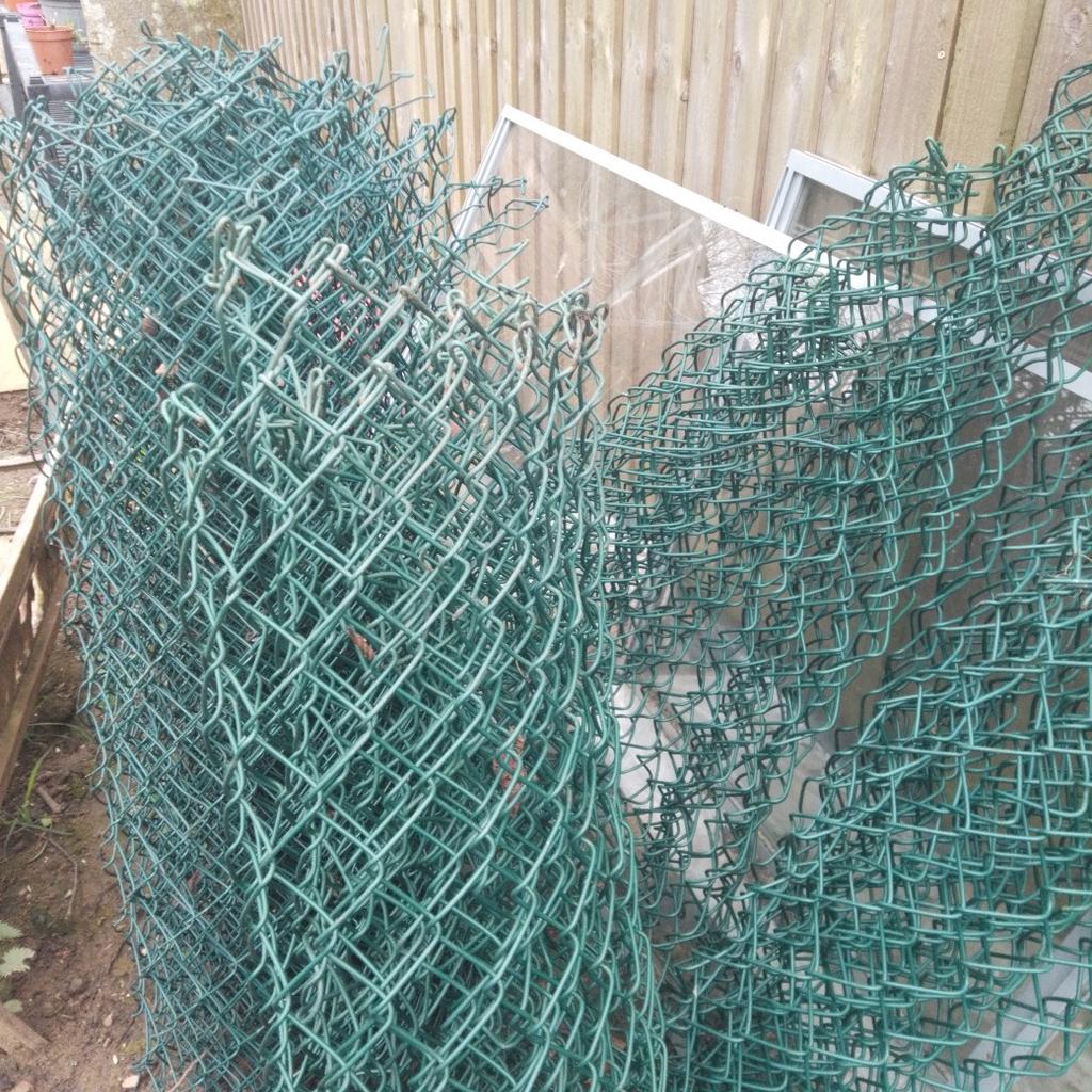 a selection of green wire garden fencing