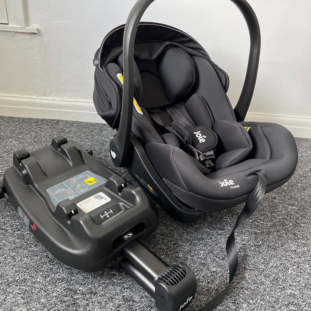 Used few time only for taxi trips. Isofix base never used.

Features:
• Suitable rearward facing from birth to 85cm, and less than 13kg
• Converts to a flat reclining seat at a comfy and cosy 157° angle - can be utilised in a vehicle or pushchair
• Features patented Intelli-Fit™ foam for exclusive first-ever side impact protection
• Exclusive Tri-Protect™ headrest offers 3 layers of security
• Grow Together™ multi-height headrest and harness system which adjusts simultaneously
• Removable full body insert
• Can be attached to a pushchair as a lie-flat carry cot or infant carrier
• Multi-position, ergonomic carry handle with soft-grip
• Easy buckling 3-point harness with padded covers
• Retractable, removable sun canopy
• Comes complete with an ISOFIX base
• Compatible with Joie mytrax™, chrome dlx™ and litetrax™ 4 pushchairs, and with other pushchairs using Maxi-Cosi® car seat adapters