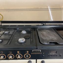 Rangemaster Leisure 110 with two ovens,grill,hot plate. 4 gas hobs and electric too,electric oven. Good included with extractor. Inside very clean immaculate condition,been stored due to house move so a little dusty on outer but still in good condition with a minor scratch on the bottom left. Paint is able to purchase to cover from Rangemaster I hear. Needs to be gone asap due to no space to store