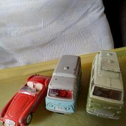 corgi and dinky toys mga sports car. standard atlas. ford Thames camper van. played with condition can post at cost or collection from sedgley Dudley . no offers