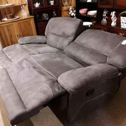 This gorgeous top quality charcoal grey suede leather three-seater manual recliner sofa is in very good condition visually..There has been a repair made to the recliner mechanism on the far left hand side which seems to be working fine but I can't guarantee how long it will last..

Both backs also come off...

7 ft long x 3 ft deep x 3 ft high...

Our second hand furniture mill shop is LOW COST MOVES, at St Paul's trading estate, Copley Mill, off Huddersfield Road, Stalybridge SK15 3DN... Delivery available for an extra charge.

There are some large metal gates next to St Paul's church... Go through them, bear immediate left and we are at the bottom of the slope, up from the red steps...

If you are interested in this or any other item, please contact me on 07734 330574, or on the shop 0161 879 9365...Many thanks, Helen.

We are OPEN Monday to Friday from 10 am - 5 pm and Saturday 10 am - 3.30 pm... CLOSED Sundays.