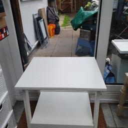 One year old IKEA white table which has a few scratches only to the top.

Very useful item.

21.5 inches x 21.5 "

Any questions then please ask