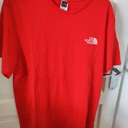Mens/Teens red north face short sleeve top in great condition does have a mark but can't see it in photo condition from smoke and pet free home  . collection only from Glascote b77
