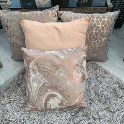 Lovely unusual pink and rose gold cushions. Like new. Cost over £14 each