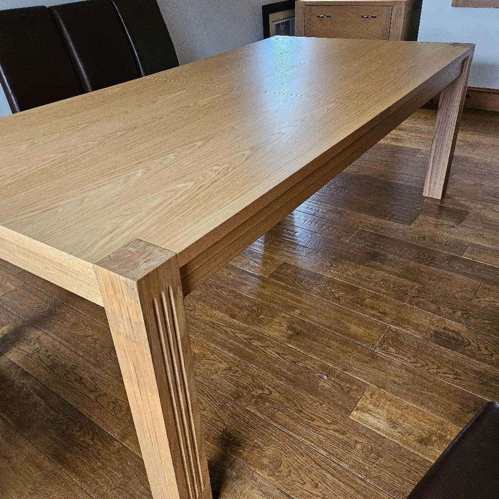 Large extending dining table handmade in oak with 6 chairs. In excellent condition
Dining table not extended
Length 2200mm
Height 770mm
Width 1100mm
Extension adds on another 530mm wide