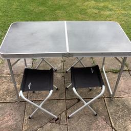 Camping table with 4 stools. Table folds and seats fit inside for easy storage. Height adjustable table legs. Good condition. Collection only.