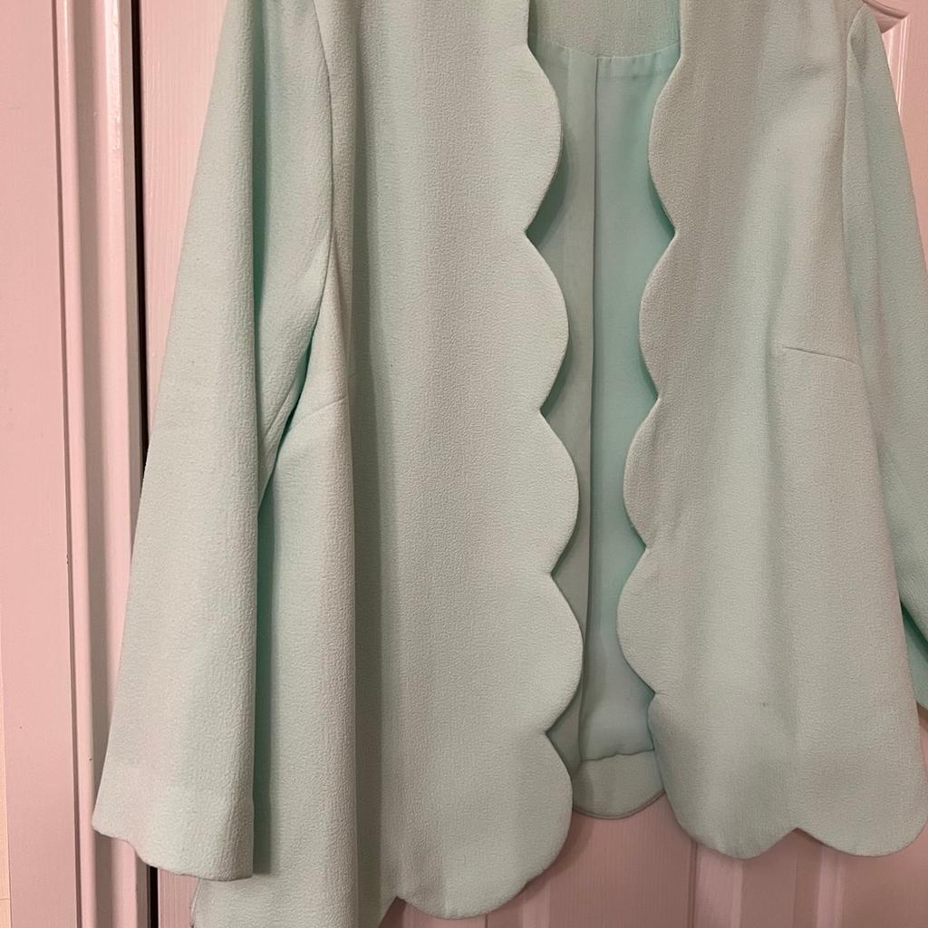 Pretty mint green jacket.hangs edge to 4 length arms.size 14.jacket length 60cm.fully lined inside.from Primark in good condition.lovely little lightweight summer jacket