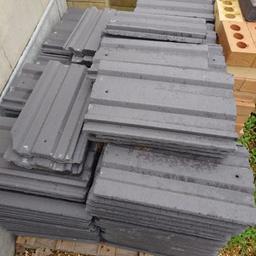 27 brand new roof tiles. Left over from recent building work. Reduced to half price for quick sale.
Material: Concrete
Colour: Greystone
Size: 387 x 229 mm
Minimum Pitch: Granular - 30° (75mm headlap)
Covering Capacity: 15.7 tiles /m², 75mm headlap 
Economic interlocking roof tile with a low profile, ideal for roofing refurbishments. Prod. by Marley, this concrete tile is strong, resilient & offers exceptional value for money.
RRP = £1.29/tile. Selling at half price-65p/tile, £82 for 127 tiles