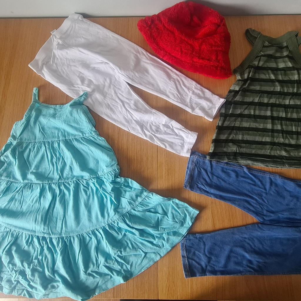 Here for sale is a small bundle of 5-6 years girls clothing.

1). A denim look pair of leggings teamed with 

2). A Next green and black strappy top 

3). A pair of white leggings

4). A turquoise H&M dress

5). A red fluffy hat 

Collection from Norton Canes, Cannock