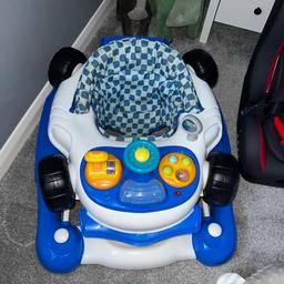 Car baby bouncer
Works perfectly fine 
Small ware on seat 
Makes sounds 
Extendable to baby’s growth
