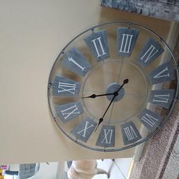 27.5 inches by 27.5 inches grey and white wall clock
