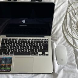 MacBook Pro mid 2014 model A1502 Used Very little, mint condition,no marks at all. Keys and touch pad have no signs of wear on them. Hard case and keyboard cover, Magic Mouse 2, carry case and charger. Second charger also included