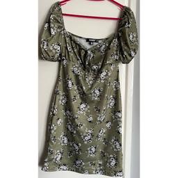 Missguided Green / khaki floral milkmaid style mini dress with puff sleeve. Uk size 10. Cute dress for spring or summer just too small for me. Originally £25. Postage included in price.
