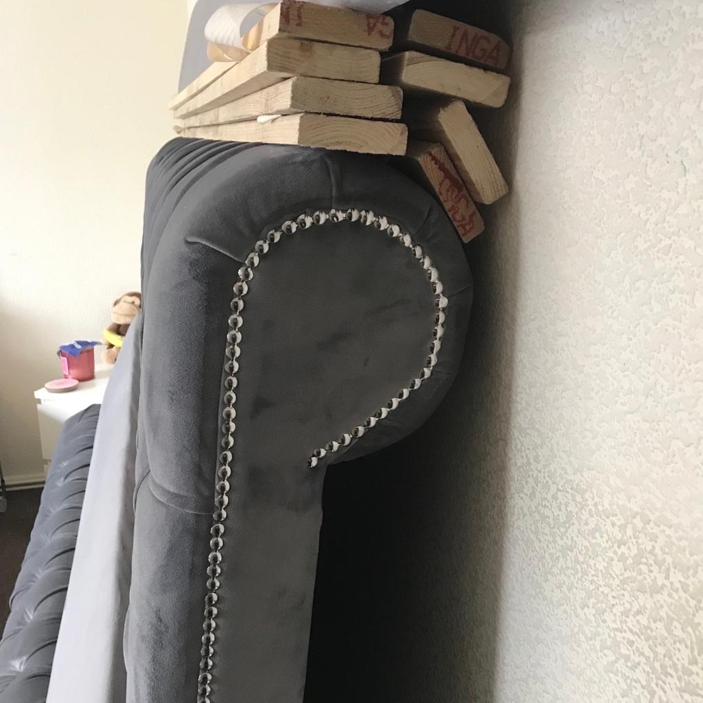 Selling for someone else new double bed (velvet) slatted base, the back of the headboard was damaged bringing it in the house (as shown) but doesn’t affect the bed, pick up only