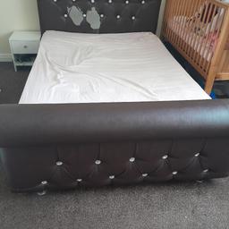 very strong sturdy double bed with mattress. in excellent condition apart from slight tear on headboard. collection from b9 5en
