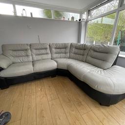 Grey/Black DFS corner sofa. Good condition with small areas of blemish & marks. Two small sections where black leather has torn whilst manoeuvring previously. Located front right where it’s caught on the stitching and rear which is out of sight.
2 piece connection at the corner turn.
Approx D980mm x H870mm x L2300x1900mm corner to corner.
