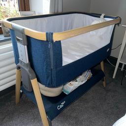 Selling my Tutti Bambino Cozee next to me. 
Not required anymore. Only problem is I can’t find the straps that secure it to your bed (I will search high and low for it)
Paid £100+, looking for £50.
Comes with 3 crib sheets. 
Mattress topper and mattress. 
Storage part underneath is a life saver 
Internal liner zips off and can’t be washed. Rest can be wiped down but comes from a smoke, pet free home!