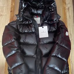 Brand new comes with a moncler bag also . Collection available BD3 Bradford or can deliver also .
