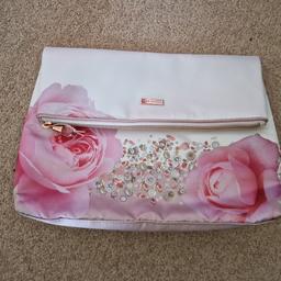 new, clutch bag ted baker, has zip to close and magnetic to fold down,  collection only b44
