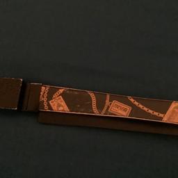 Used Versace couture belt for sale. Colour comes in black and yellow with Versace designs. Available for special delivery