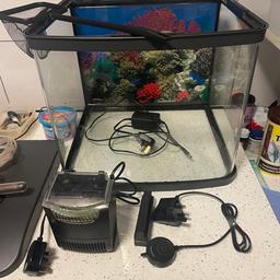 90lt fish tank kit like new tank no marks comes with internal filter, small air pump, 150w heater, thermometer, small bits and peace’s double check valve and air stones, stick on cleaning magnet,blue led lights and white led lights switch to turn on/ off is in top of lid,small net and a small tub of food. Lovely little start kit for children all you need is gravel and fish. And don’t forget to water haha