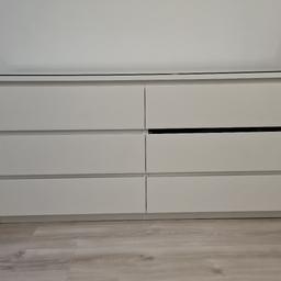 White Malm chest of drawers 
Ikea brand.
Glass top
Piece of wood missing above the drawer, which can be replaced by ikea from their missing parts section.