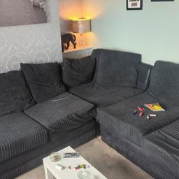 6 seater cord corner sofa, comes apart into three sections, washable cushion covers. very big and comfy