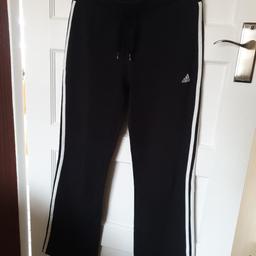 Adidas casual joggers 
Unusual flare look
Black with classic 3 white stripes, full length 
Worn once
Excellent condition 
Collection only