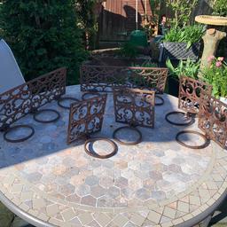 Wrought iron wall mounted pot holders.
6x singles
2 x treble holders.

Great outdoor condition
