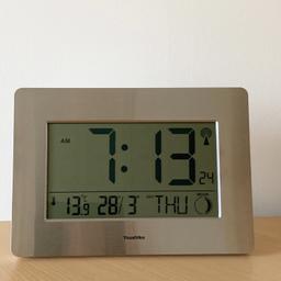 Large Jumbo Big Digit LCD Radio Controlled Digital Wall Clock, with Indoor Temperature Display and moon phase. Screen Display Includes Date , Month & day of the week. Self Set Automatically , You never have to do anything. Wall mounting or Table standing, Clock Dimensions: 23 x 16 x 2.5 cm.