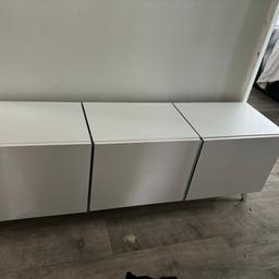 Great condition, as new. Gloss white doors with glass shelf dividers(great for LED Lights inside)
Sleek and stylish design. 
L 138cm
H 36
W 35
Pick up Ilford IG2