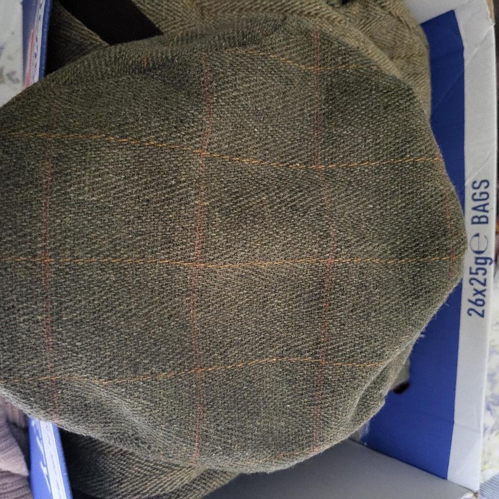 we have a country wear flat cap for sale in excellent condition from smoke and pet free home collection only